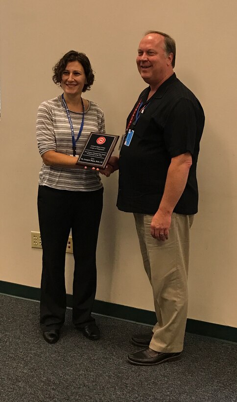 The USACE Tommy Schmidt National Dam Safety Professional of the Year Award for 2016 was presented to Dr. Georgette Hlepas (DSMMCX) on 19 October 2016 during the first quarter meeting of the USACE Dam Safety Steering Committee in Boston, MA.  The award is given annually to one deemed to have made the most significant contribution nationally to the USACE Dam Safety Program. 