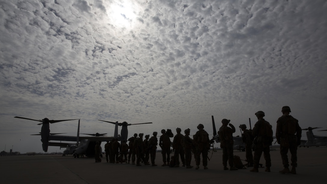 U.S. Marines assigned to Special Purpose Marine Air Ground Task Force-Crisis Response-Africa prepare to board an MV-22B Osprey during an alert force drill at Morón Air Base, Spain, Oct. 20, 2016. The purpose of the rehearsal was to assess the unit's ability to integrate its elements and respond to various conditions in a time-constrained crisis.  SPMAGTF-CR-AF is designed to provide contingency support to U.S. Africa Command, including tactical recovery of aircraft and personnel, embassy reinforcement, support to noncombatant evacuation operations, humanitarian assistance and disaster relief. 