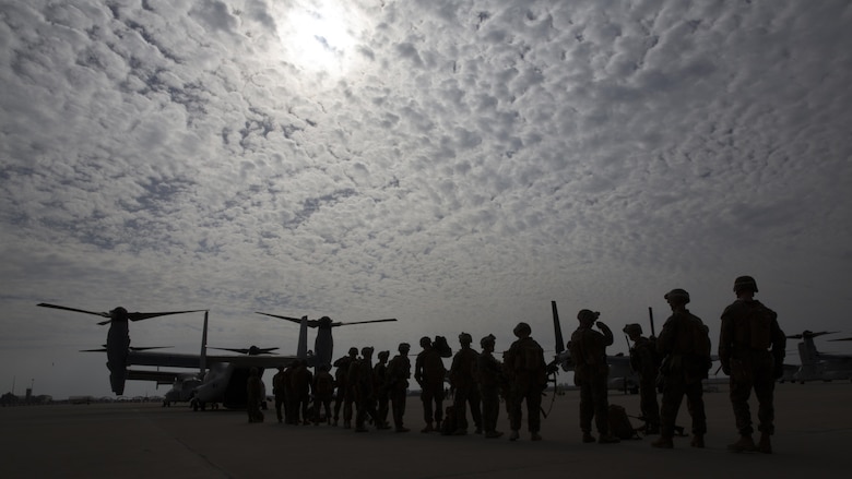 U.S. Marines assigned to Special Purpose Marine Air Ground Task Force-Crisis Response-Africa prepare to board an MV-22B Osprey during an alert force drill at Morón Air Base, Spain, Oct. 20, 2016. The purpose of the rehearsal was to assess the unit's ability to integrate its elements and respond to various conditions in a time-constrained crisis.  SPMAGTF-CR-AF is designed to provide contingency support to U.S. Africa Command, including tactical recovery of aircraft and personnel, embassy reinforcement, support to noncombatant evacuation operations, humanitarian assistance and disaster relief. 