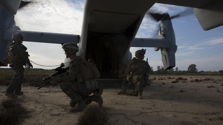 U.S. Marines assigned to Special Purpose Marine Air Ground Task Force-Crisis Response-Africa provide security as team members insert from an MV-22B Osprey during an alert force drill at Naval Station Rota, Spain, Oct. 20, 2016. The purpose of the drill was to rehearse and assess the SPMAGTF’s ability to integrate elements and respond to a time-sensitive crisis. SPMAGTF-CR-AF is designed to provide contingency support to U.S. Africa Command, including tactical recovery of aircraft and personnel, embassy reinforcement, support to noncombatant evacuation operations, humanitarian assistance and disaster relief.