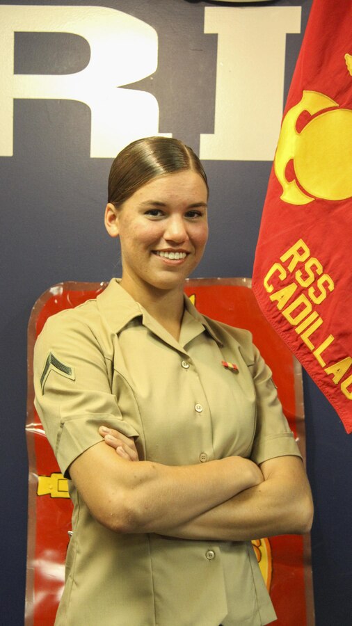 U.S. Marine Corps Pfc. Anne E. Lyman, a native of Traverse City, Michigan and recent Company honor graduate of Oscar Company, 4th Recruit Training Battalion, poses for a photo on Oct. 19, 2016 at Recruiting Substation Cadillac. Lyman is expected to report to Marine Combat Training in November where she will master basic infantry tactics to maintain combat readiness.  (U.S. Marine Corps photo by Cpl. Immanuel M. Johnson/Released)