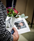 Jan Grothe, mother of the Fallen Soldier, holds a photo of her son during the memorialization ceremony of the Cpl. Kelly B. Grothe Army Reserve Center in Hayden, Idaho, Oct. 22. Grothe was a United States Army Combat Engineer assigned to Bravo Company, 321st Engineer Battalion, who was killed in action while conducting route clearance operations in the area of Abu Bali, Iraq during the Global War on Terrorism, May 3, 2007. He was 21 years old.