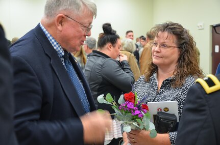 U.S. Army Reserve Ambassador, for the state of Washington, Hon. William Fred Aronow, Ret., (left) offers his condolences to Jan Grothe, (right) mother of the Fallen Soldier, during the memorialization ceremony of the Cpl. Kelly B. Grothe Army Reserve Center in Hayden, Idaho, Oct. 22. Grothe was a United States Army Combat Engineer assigned to Bravo Company, 321st Engineer Battalion, who was killed in action while conducting route clearance operations in the area of Abu Bali, Iraq during the Global War on Terrorism, May 3, 2007. He was 21 years old.