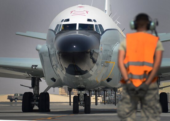 A RC-135 Rivet Joint from the 379th Air Expeditionary Wing prepares to taxi onto the runway before a mission Oct. 21, 2016, at Al Udeid Air Base, Qatar. The RC-135 Rivet Joint is a reconnaissance aircraft that supports theater and national level consumers with near real-time on-scene electronic warfare support, intelligence collection, analysis, and dissemination capabilities. (U.S. Air Force photo by Senior Airman Miles Wilson)