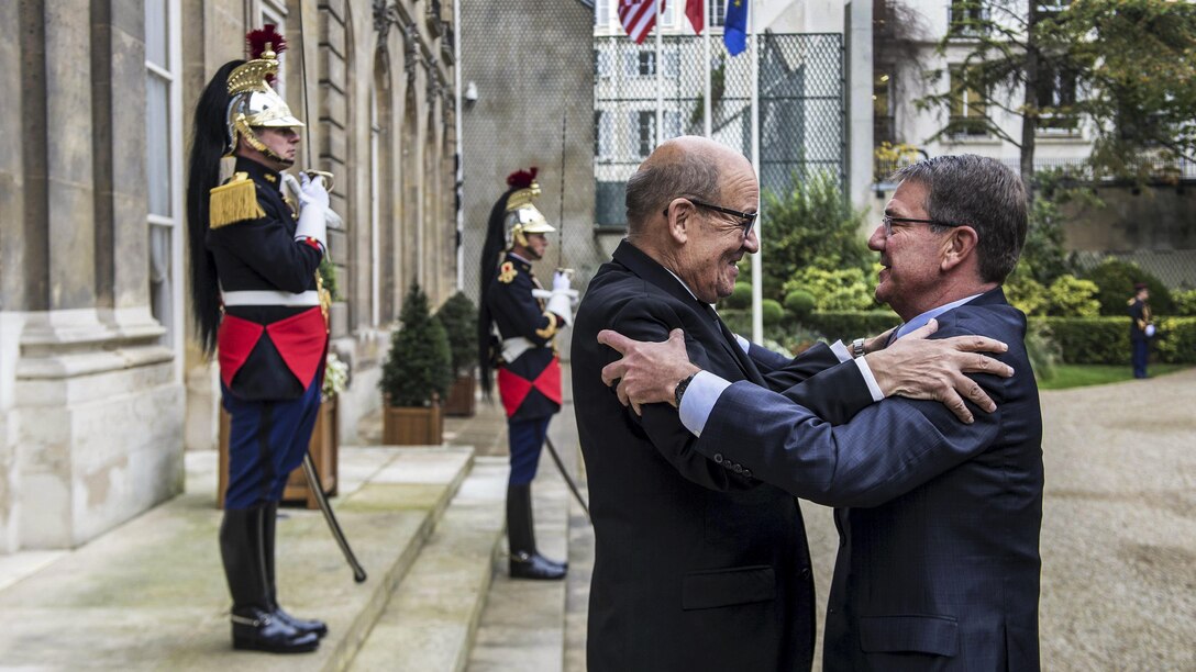 Defense Secretary Ash Carter, right, embraces French Defense Minister Jean-Yves Le Drian in Paris, Oct. 25, 2016, before a meeting. DoD photo by Air Force Tech. Sgt. Brigitte N. Brantley<br /><br /><a target="_blank" href="https://www.flickr.com/photos/secdef">
Click here to see more images on Secretary Carter's Flickr page. </a>