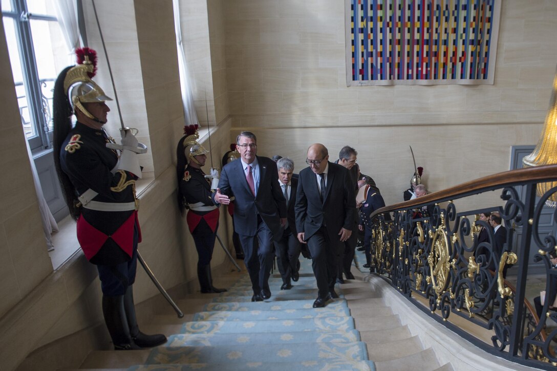Defense Secretary Ash Carter walks with French Defense Minister Jean-Yves Le Drian before a meeting in Paris, Oct. 25, 2016. DoD photo by Air Force Tech. Sgt. Brigitte N. Brantley