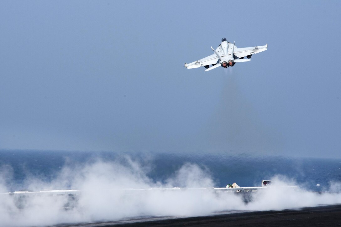 An F/A-18E Super Hornet launches from the flight deck of the aircraft carrier USS Dwight D. Eisenhower in the Persian Gulf, Oct. 20, 2016. Navy photo by Petty Officer 3rd Class Nathan T. Beard