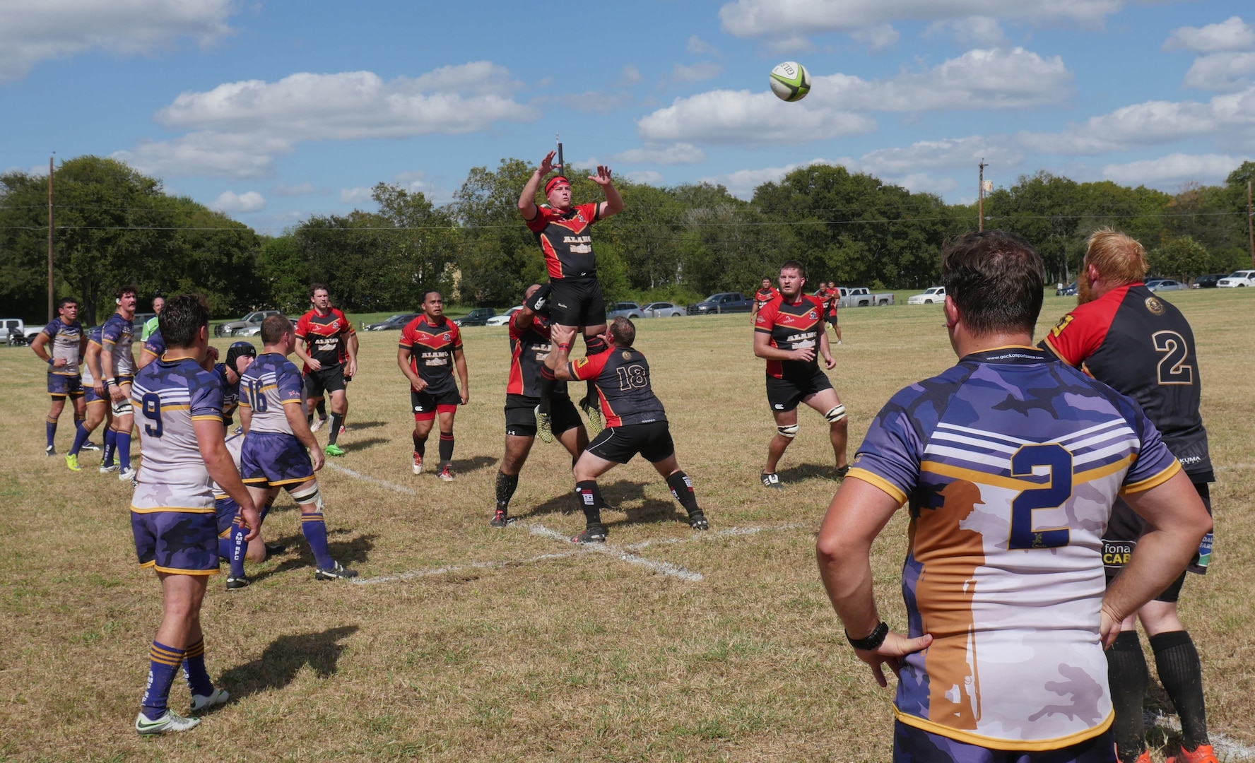The San Antonio Rugby Football Club, a 45-year-old organization formed by doctors from Brooke Army Medical Center in 1971, execute a “lineout” to throw the ball back into play in their match against the British Army Medical Services Rugby Team at the Wheatley Sports complex in San Antonio Oct. 15. The visiting British team broke open a close match in the second half and won, 45-10. 