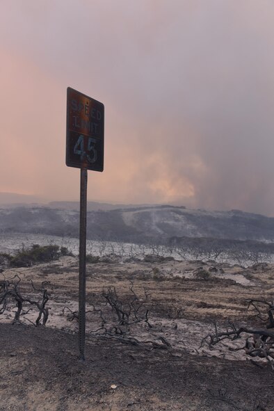 A charred sign indicates the destruction fires caused at Vandenberg Air Force Base, California. Fires at South Base were the largest in Vandenberg’s history, burning more than 12,500 acres. North Base fires threatened some of the 50th Space Wing’s geographically separated unit’s personnel and facilities. (U.S. Air Force photo/Staff Sgt. Shane Phipps) 