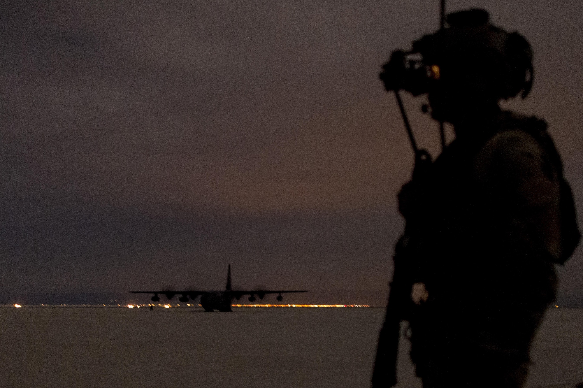 A Special Tactics Airman assigned to the 26th Special Tactics Squadron communicate with aircraft during a Full Mission Profile exercise at White Sands Missile Range, N.M., Oct. 12, 2016.  The FMP was utilized to integrate special operations forces and foster tactical maturity through deliberate planning and execution of a force projection package and enable Special Tactics Airmen pre-deployment evaluation. (U.S. Air Force photo by Tech. Sgt. Manuel J. Martinez)