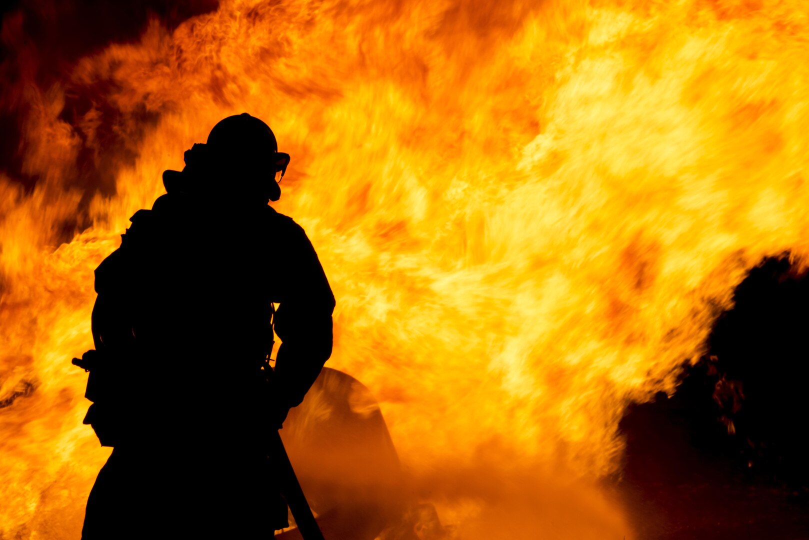 Firefighters from Joint Base San Antonio-Randolph Fire Emergency Services extinguish an aircraft engine fire Oct. 17, 2016 at the Camp Talon fire training grounds on JBSA-Randolph. Although aircraft fires are rare at JBSA locations, engaging in ARFF – aircraft rescue and firefighting – training gives firefighters the ability to successfully contain and extinguish blazes should they occur on or off base.