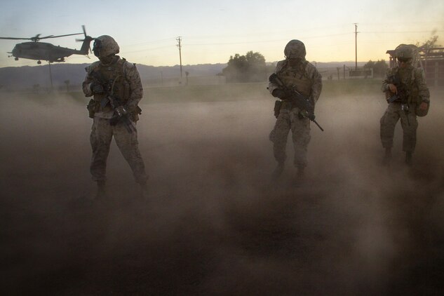 Marines with 2nd Battalion, 3rd Marine Regiment, exit a landing zone during a Non-combatant Evacuation Operation exercise aboard Marine Corps Air Ground Combat Center, Twentynine Palms, Calif., Oct. 14, 2016. (Official Marine Corps photo by Cpl. Connor Hancock/Released)