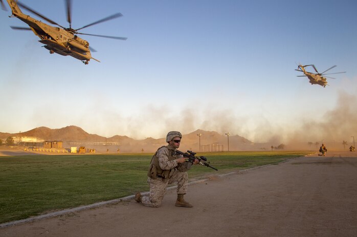 Lance Cpl. Dave Rhodes, rifleman, 2nd Battalion, 3rd Marine Regiment, provides security during a Non-combatant Evacuation Operation exercise aboard Marine Corps Air Ground Combat Center, Twentynine Palms, Calif., Oct. 14, 2016. (Official Marine Corps photo by Cpl. Connor Hancock/Released)