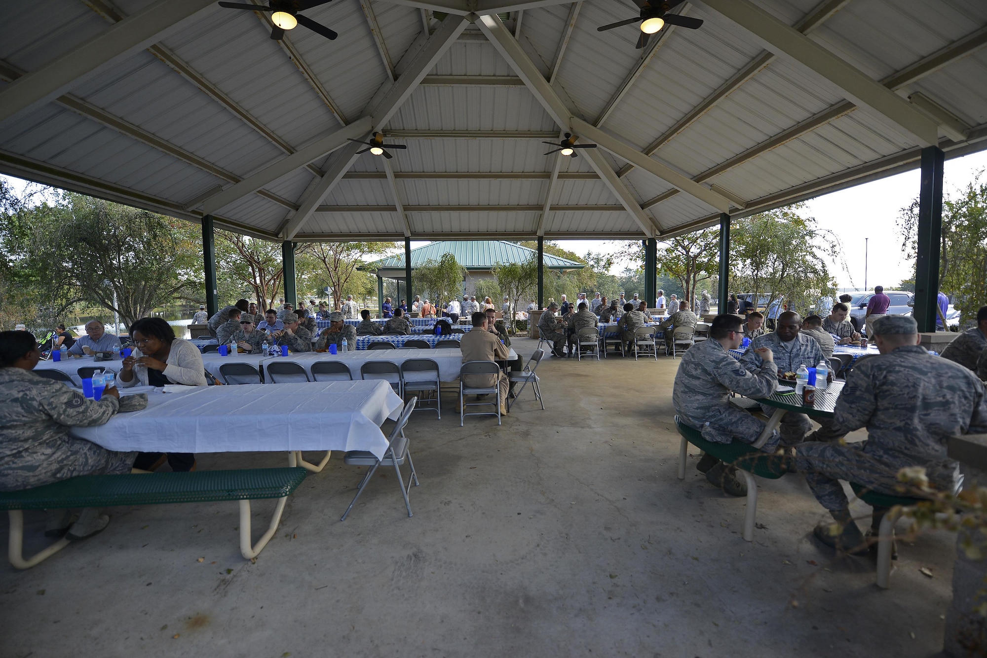 Team Shaw members gather at Memorial Lake to attend the Team Shaw Diamond Council’s “Oktoberfest” event at Shaw Air Force Base, S.C., Oct. 20, 2016. During the event, members of the council provided Shaw Airmen with food and drinks to thank them for the work they do on a daily basis. (U.S. Air Force photo by Airman 1st Class BrieAnna Stillman) 
