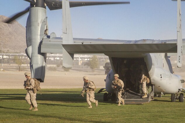 Marines with 2nd Battalion, 3rd Marine Regiment, exit an MV-22 “Osprey” during a Non-combatant Evacuation Operation exercise aboard Marine Corps Air Ground Combat Center, Twentynine Palms, Calif., Oct. 14, 2016. (Official Marine Corps photo by Cpl. Connor Hancock/Released)