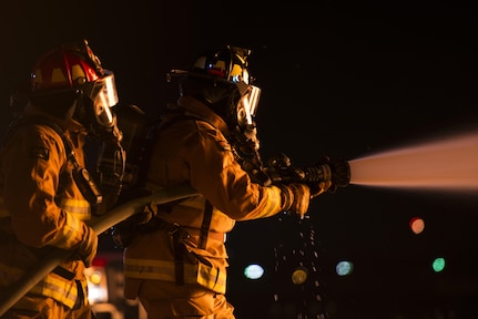 Firefighters from Joint Base San Antonio-Randolph Fire Emergency Services extinguish an aircraft engine fire at the Camp Talon fire training grounds on JBSA-Randolph Oct. 17, 2016. The purpose of the aircraft live fire training is to provide a realistic and safe opportunity for firefighters to apply techniques learned as an apprentice and honed throughout their careers. 