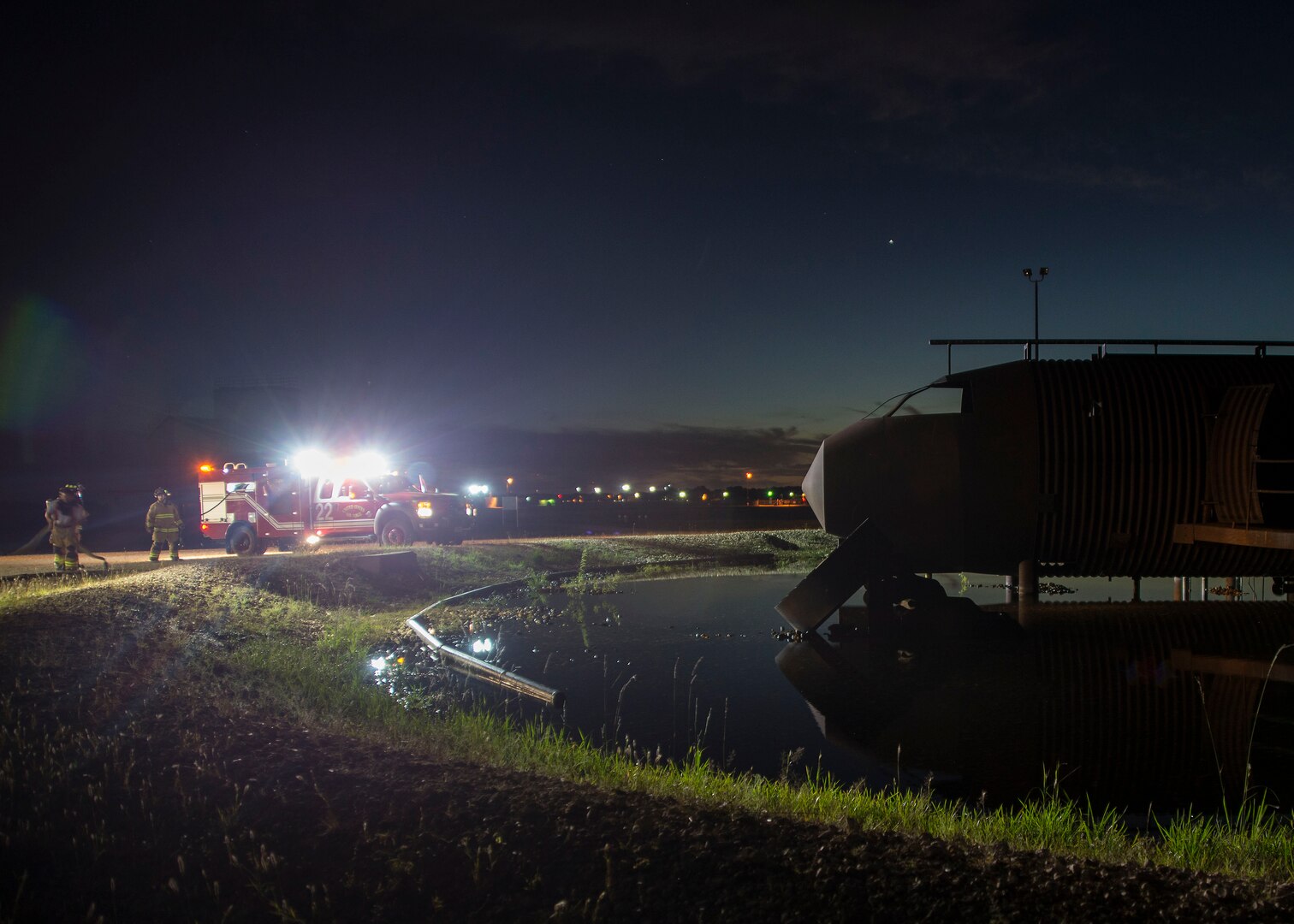 Firefighters from the Joint Base San Antonio Fire Emergency Services set up an aircraft rescue and firefighting, or ARFF, night fire scenario to conduct training at the Camp Talon fire training grounds on JBSA-Randolph Oct. 17, 2016. The purpose of ARFF training is to provide a realistic and safe opportunity for firefighters to apply techniques learned as an apprentice and honed throughout their careers. 