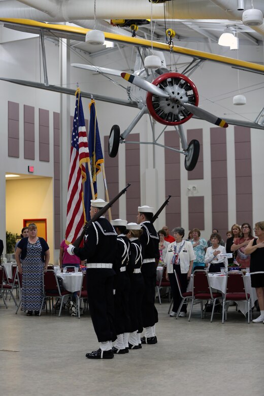 A Navy color guard presents the national colors at the 2016 Salute to Women of the Military event at the Tourist and Event Center in Havelock, N.C., Oct. 20, 2016. In 1987, Bee Mayo and Jean Nelson first discussed the idea of recognizing contributions made by women in the military. Today, that legacy lives on in the Eastern North Carolina area through the Salute to Women of the Military. The event continues to identify women as a vital part of the U.S. Armed Forces. Women from all branches of the military who served in the past or are currently serving came to support the occasion. Mayo is a board member of the Craven County Council on Women, and Nelson is the regional director for the NC Council for Women. (U.S. Marine Corps photo by Lance Cpl. Mackenzie Gibson/Released)