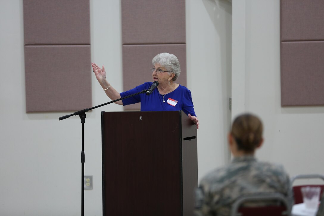 Bee Mayo, co-chair of the 2016 Salute to Women of the Military event, speaks to guests at the Tourist and Event Center in Havelock, N.C., Oct. 20, 2016. In 1987, Mayo and Jean Nelson first discussed the idea of recognizing contributions made by women in the military. Today, that legacy lives on in the Eastern North Carolina area through the Salute to Women of the Military. The event continues to identify women as a vital part of the U.S. Armed Forces. Women from all branches of the military who served in the past or are currently serving came to support the occasion. Mayo is a board member of the Craven County Council on Women, and Nelson is the regional director for the NC Council for Women. (U.S. Marine Corps photo by Lance Cpl. Mackenzie Gibson/Released)