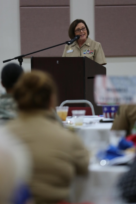 Navy Capt. Angela Nimmo gives her speech as the guest speaker for the 2016 Salute to Women of the Military event at the Tourist and Event Center in Havelock, N.C., Oct. 20, 2016. In 1987, Bee Mayo and Jean Nelson first discussed the idea of recognizing contributions made by women in the military. Today, that legacy lives on in the Eastern North Carolina area through the Salute to Women of the Military. The event continues to identify women as a vital part of the U.S. Armed Forces. Women from all branches of the military who served in the past or are currently serving came to support the occasion. Mayo is a board member of the Craven County Council on Women, Nelson is the regional director for the NC Council for Women, and Nimmo is the commanding officer for the MCAS Cherry Point Naval Health Clinic. (U.S. Marine Corps photo by Lance Cpl. Mackenzie Gibson/Released)