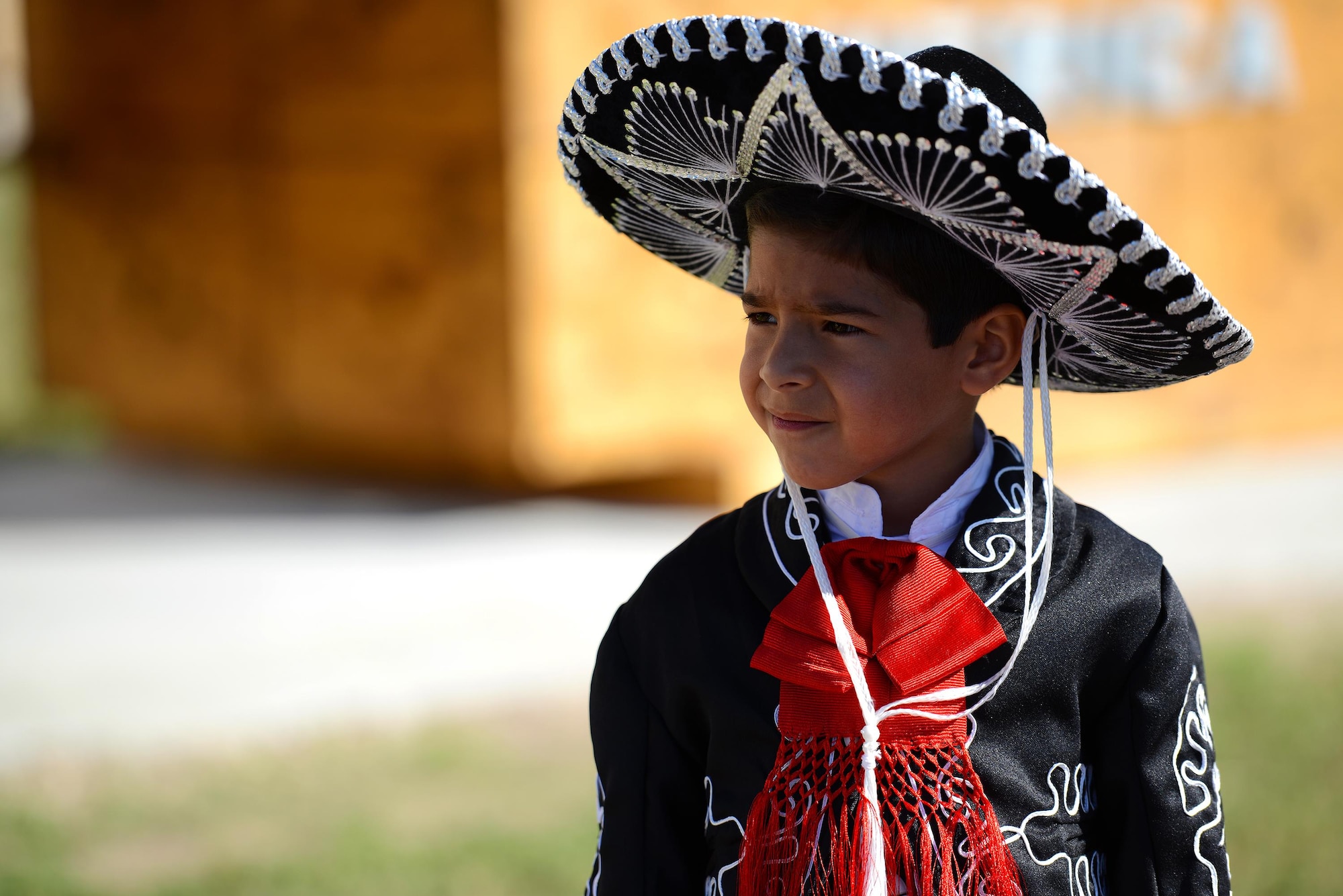 Mariano Faz, Ciudad Acuña youth, observes the 56th annual Abrazo ceremony at the Convention Center in Del Rio, Texas, Oct. 21, 2016. The Abrazo, which means to embrace in Spanish, is an annual tradition that symbolizes the friendship between Mexico and the U.S. where both cultures are shared with one another. (U.S. Air Force photo/Senior Airman Ariel D. Partlow)