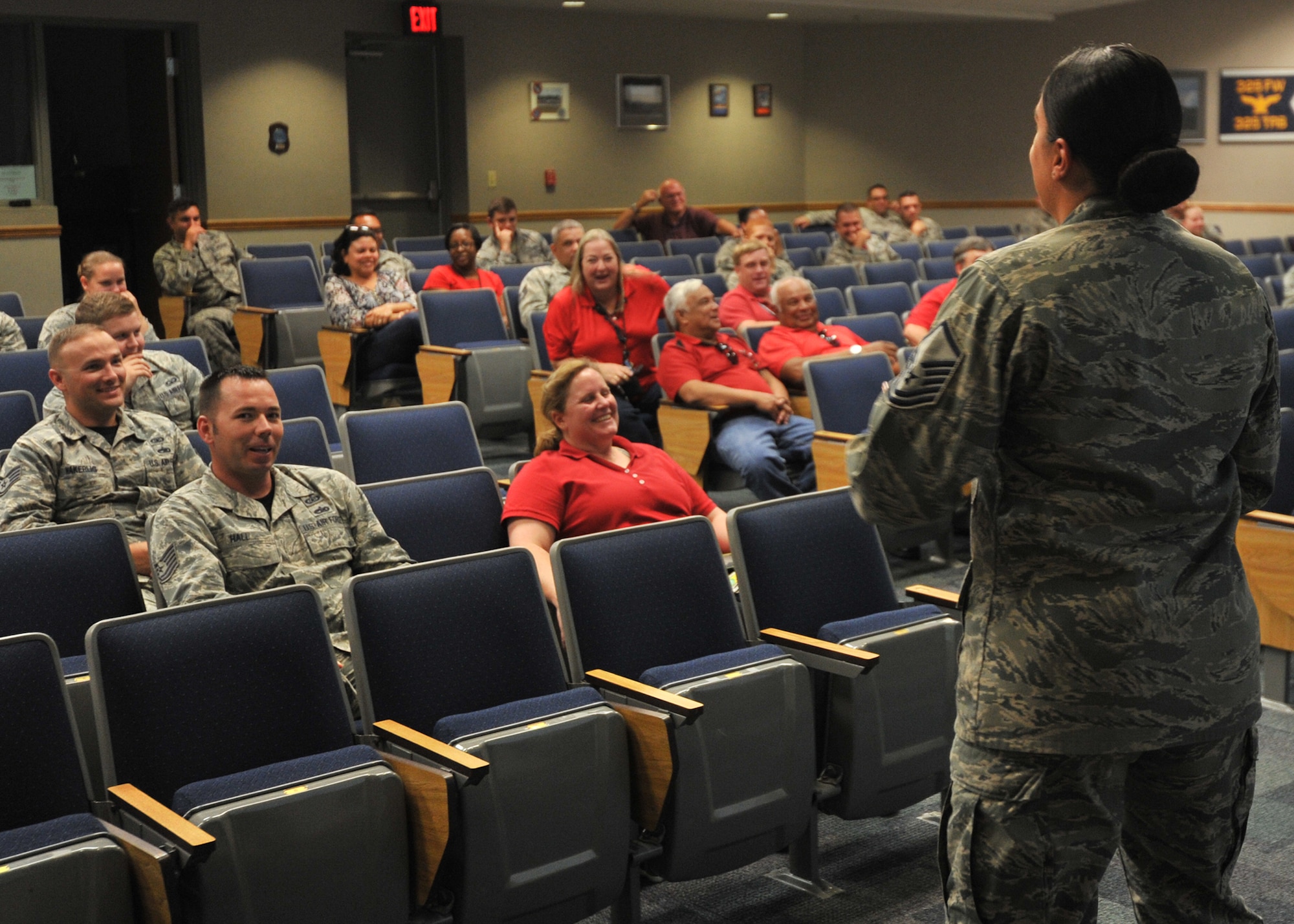 U.S. Air Force Master Sgt. Samantha Whitfield, 325th Maintenance Squadron munitions inspection NCO in charge, explains the importance of Green Dot training at the 337th Air Control Squadron Dex Rogers auditorium on Tyndall AFB, Fla., Oct. 20, 2016. Department of Defense personnel are required to complete the Green Dot training no later than Dec. 31, 2016.(U.S. Air Force photo by Senior Airman Ty-Rico Lea/Released)
