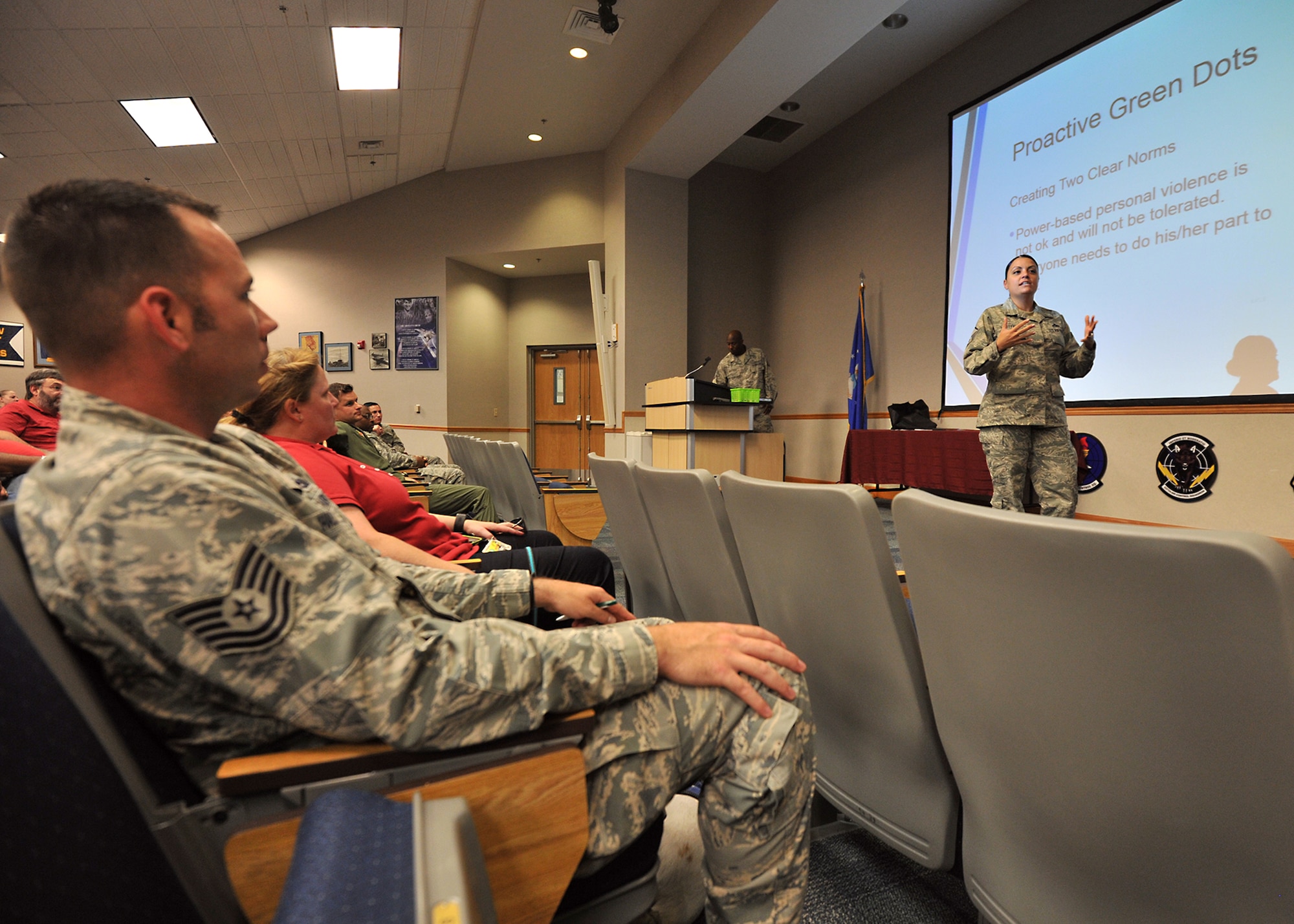U.S. Air Force Master Sgt. Samantha Whitfield, 325th Maintenance Squadron munitions inspection NCO in charge, gives examples of the negative impact a person can have by not employing Green Dot lesson objectives at the 337th Air Control Squadron Dex Rogers auditorium on Tyndall AFB, Fla., Oct. 20, 2016. Green Dot training focuses on fortifying the existing principles of the core values and teaches students how to apply them to difficult situations such as sexual assault. (U.S. Air Force photo by Senior Airman Ty-Rico Lea/Released)