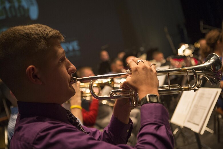 Corporal James Draffen, a trumpet player with Marine Corps Band New Orleans, rehearses at the Ponce La Perla Theater before a concert to celebrate the Marine Corps Reserve Centennial in Puerto Rico on Oct. 17, 2016. The Marine Corps Reserve is commemorating 100 years of rich history, heritage, espirit-de-corps, and a bond with Puerto Rico and communities across the U.S. The celebration recognizes the Reserve's essential role as a crisis response force and expeditionary force in readiness, constantly preparing to augment the active component. (U.S. Marine photo by Sgt. Sara Graham/Released)