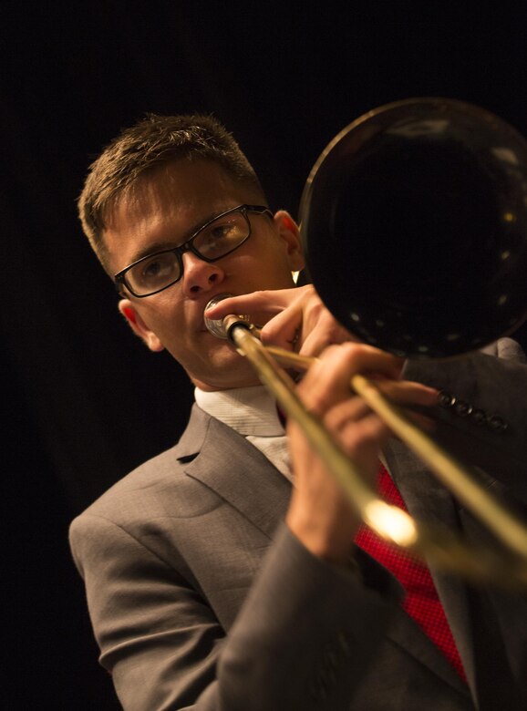 Corporal David Linnenkamp, a trombone player with Marine Corps Band New Orleans, rehearses at the Ponce La Perla Theater before a concert to celebrate the Marine Corps Reserve Centennial in Puerto Rico on Oct. 17, 2016. The Marine Corps Reserve is commemorating 100 years of rich history, heritage, espirit-de-corps, and a bond with Puerto Rico and communities across the U.S. The celebration recognizes the Reserve's essential role as a crisis response force and expeditionary force in readiness, constantly preparing to augment the active component. (U.S. Marine photo by Sgt. Sara Graham/Released)