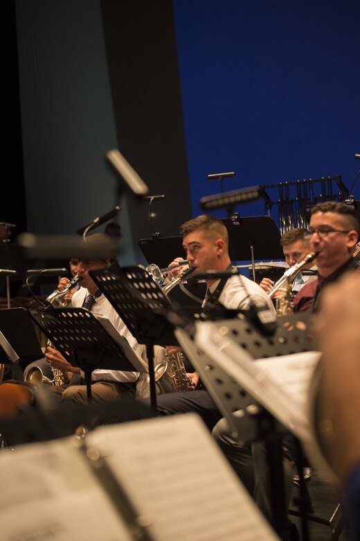 Members of the Marine Corps Band New Orleans rehearse at the Ponce La Perla Theater for a concert to celebrate the Marine Corps Reserve Centennial in Puerto Rico on Oct. 17, 2016. The Marine Corps Reserve is commemorating 100 years of rich history, heritage, espirit-de-corps, and a bond with Puerto Rico and communities across the U.S. The celebration recognizes the Reserve's essential role as a crisis response force and expeditionary force in readiness, constantly preparing to augment the active component. (U.S. Marine photo by Sgt. Sara Graham/Released)