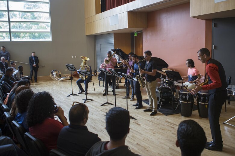 Members of Marine Corps Band New Orleans provide Master music classes to  students from the Conservatorio de Musica de Puerto Rico in San Juan, before kicking off the Marine Corps Reserve Centennial celebration concert Oct. 18, 2016. The classes showed the students how a professional military band plays, while also allowing them to learn about the history of the Marine Corps Reserves.  The Marine Corps Reserve is commemorating 100 years of rich history, heritage, espirit-de-corps, and a bond with Puerto Rico and communities across the U.S. The celebration recognizes the Reserve's essential role as a crisis response force and expeditionary force in readiness, constantly preparing to augment the active component. (U.S. Marine photo by Sgt. Sara Graham/Released)