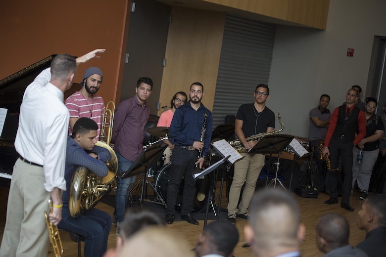 Master Sgt. Timothy Otis, Marine Corps recruiting command head musician procurement, and guest trumpet player with the Marine Corps Band New Orleans, teaches a Master class on music to students attending the Conservatorio de Musica de Puerto Rico in San Juan, before kicking off their Marine Corps Reserve Centennial celebration concert on Oct. 18, 2016. The Marine Corps Reserve is commemorating 100 years of rich history, heritage, espirit-de-corps, and a bond with Puerto Rico and communities across the U.S. The celebration recognizes the Reserve's essential role as a crisis response force and expeditionary force in readiness, constantly preparing to augment the active component. (U.S. Marine photo by Sgt. Sara Graham/Released)