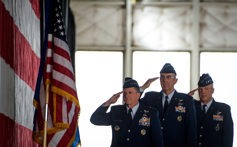 Left, Air Chief of Staff Gen. David L. Goldfein, Gen. John Hyten, outgoing commander of Air Force Space Command, and Gen. John Raymond salute during the National Anthem, Oct. 25, 2016 at Peterson Air Force Base, Colo. Raymond took command of AFSPC minutes later. (U.S. Air Force Photo/Tech. Sgt. David Salanitri)