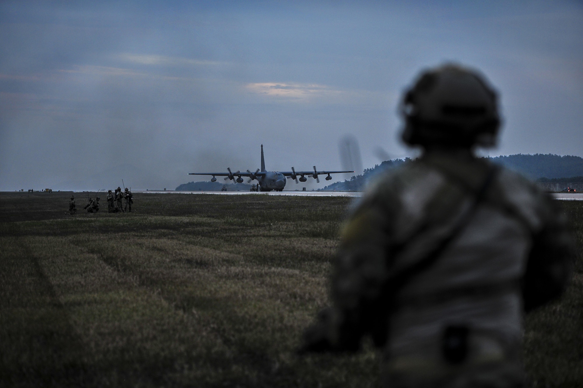 A U.S. Air Force combat controller assigned to the 1st Special Operations Squadron, runs toward a U.S. Air Force MC-130H Combat Talon II, assigned to the 353rd Special Operations Group at Kunsan Air Base, Republic of Korea, Oct. 22, 2016. Members from the 320th STS and 1st SOS worked with the ROK 255th SOS to enhance U.S. and ROK Air Force Special Operations Forces' capabilities. They conducted infiltration methods, jump clearing team operations, airfield establishment, aircraft control and close air support familiarization. (U.S. Air Force photo by Senior Airman Colville McFee/Released)