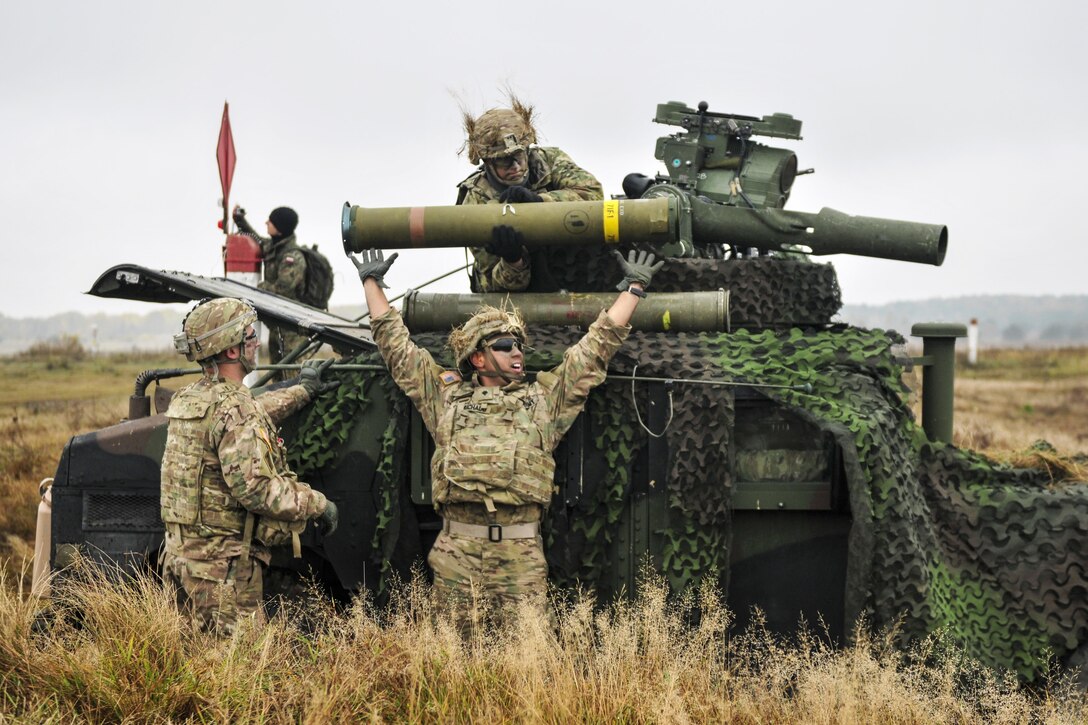 Paratroopers load an anti-tank missile during weapons training at a range in Drawsko Pomorskie, Poland, Oct. 22, 2016. U.S. and Polish forces joined to demonstrate deterrence capabilities through airborne assault and combined defensive operations. Army photo by Sgt. William A. Tanner