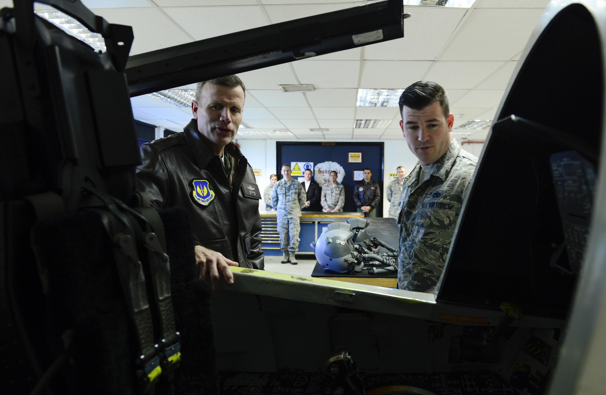 Gen. Tod Wolters (left), U.S. Air Forces in Europe and Air Forces Africa commander, learns about the aircrew emergency oxygen simulator at the 48th Component Maintenance Squadron during his visit to Royal Air Force Lakenheath, England, Oct. 25. The simulator provides aircraft operators a controlled and realistic experience of an emergency oxygen system activation. (U.S. Air Force photo by Senior Airman Malcolm Mayfield)