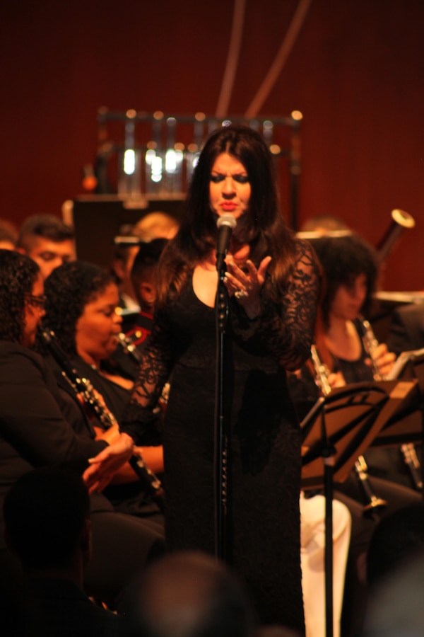 Famed Opera singer Hilda Ramos, the Marine Corps Band New Orleans, and students from the Conservatorio de Musica de Puerto Rico perform a musical piece for the local community during the Marine Forces Reserve Centennial Celebration concert at the Conservatory de Musica de Puerto Rico in San Juan, Puerto Rico, Oct. 18, 2016. The Marine Corps Reserve is commemorating 100 years of rich history, heritage, espirit-de-corps, and a bond with Puerto Rico and communities across the U.S.  The celebration recognizes the Reserve's essential role as a crisis response force and expeditionary force in readiness, constantly preparing to augment the active component. (U.S. Marine photo by Master Sgt. John A. Lee, II / Released) 