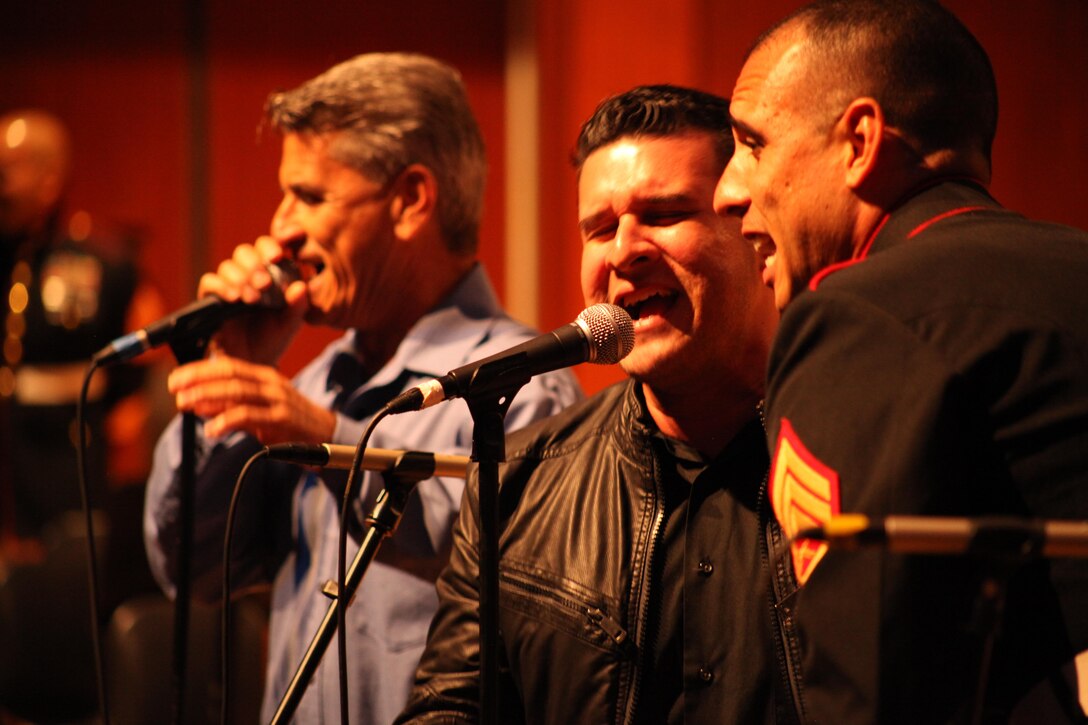 Marine Corps Band New Orleans Jazz Ensemble along with special guest vocal artist and Puerto Rican native, Jerry Rivas (center), perform a latin musical combo for the local community during the Marine Forces Reserve Centennial Celebration concert at the Conservatorio de Musica de Puerto Rico in San Juan, Puerto Rico, Oct 18, 2016. The Marine Corps Reserve is commemorating 100 years of rich history, heritage, espirit-de-corps, and a bond with Puerto Rico and communities across the U.S. The celebration recognizes the Reserve's essential role as a crisis response force and expeditionary force in readiness, constantly preparing to augment the active component. (U.S. Marine photo by Master Sgt. John A. Lee, II / Released) 