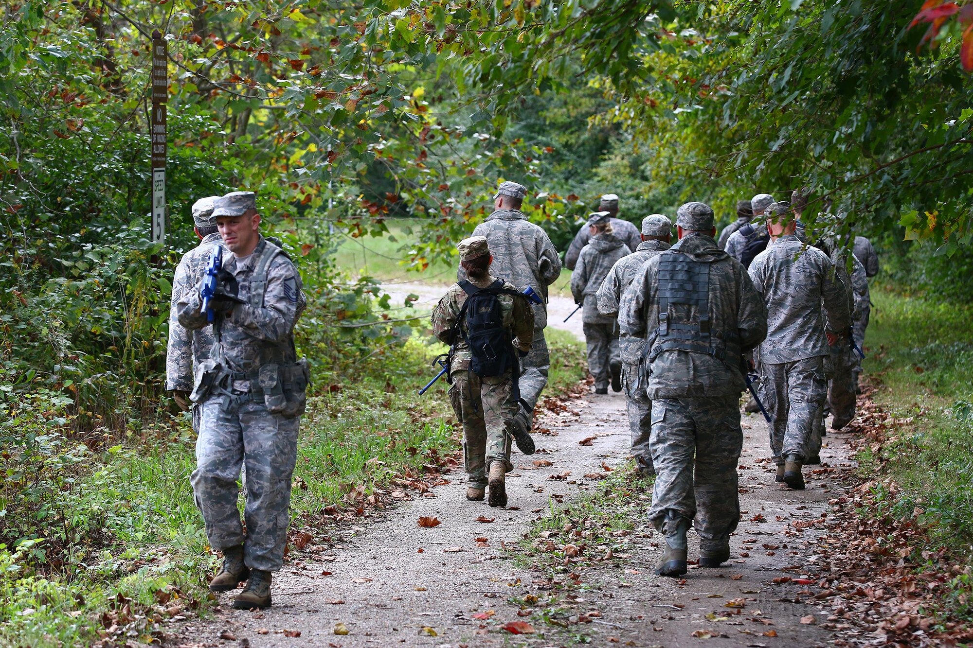 Master Sgt. Ryan LaMarr provides security at the rear to keep his fellow 445th Security Forces Squadron Airmen safe as part of a training scenario executed during the squadron’s land navigation training conducted here Oct. 2, 2016. Security forces members must accurately and effectively perform their tactical capabilities to defend against threats. (U.S. Air Force photo /Tech. Sgt. Patrick O’Reilly) 