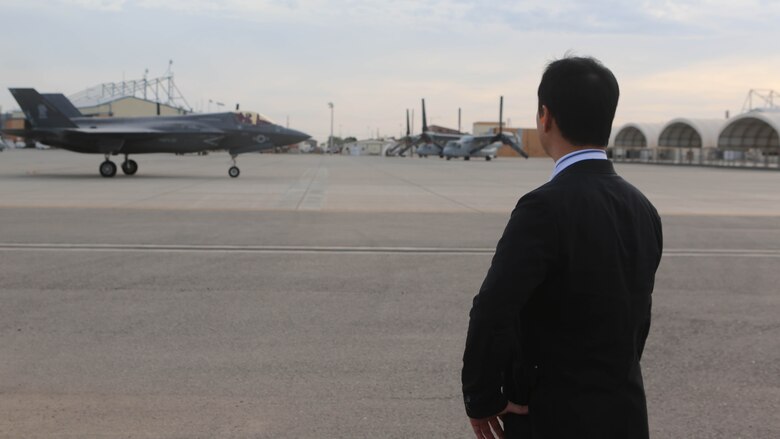 Yoshihiko Fukuda, mayor of Iwakuni, Japan, watches an F-35B Lightning II taxi down the flight line at Marine Corps Air Station Yuma, Arizona, Oct. 24,2016. Fukuda visited the air station to speak with Marine Corps aviation officials, observe the capabilities of the F-35B Lightning II and expand his knowledge of the aircraft before Marine Fighter Attack Squadron 121 relocates to MCAS Iwakuni next year. 