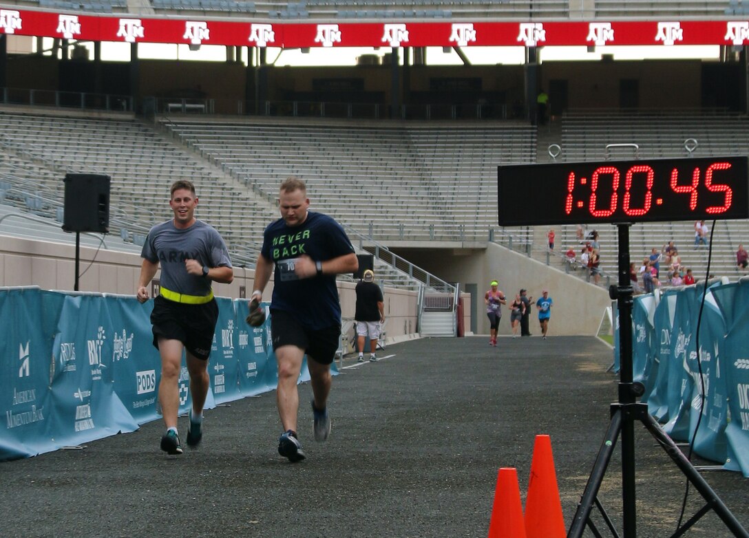 Army Capt. Michael J. Havro, (In Army PTs) 211th Mobile Public Affairs executive office and a native of Palatine, IL and Spc. Logan N. Rath also with the 211th MPAD and a native of College Station keep pace in a 10K race held in College Station, TX on the Texas A&M campus on 16 October 2016.
The race is part of the Bryan/College Station races series that host progressively longer races culminating in a full marathon.
(U.S. Army photo by Sgt. Rigo Cisneros)