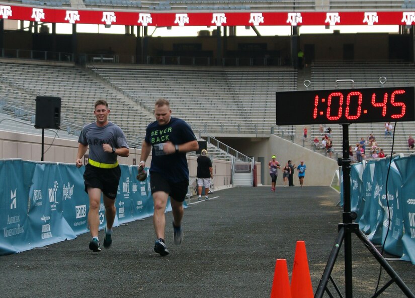 Army Capt. Michael J. Havro, (In Army PTs) 211th Mobile Public Affairs executive office and a native of Palatine, IL and Spc. Logan N. Rath also with the 211th MPAD and a native of College Station keep pace in a 10K race held in College Station, TX on the Texas A&M campus on 16 October 2016.
The race is part of the Bryan/College Station races series that host progressively longer races culminating in a full marathon.
(U.S. Army photo by Sgt. Rigo Cisneros)