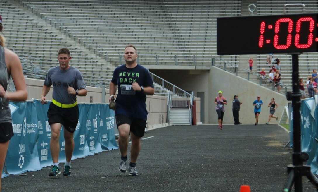 Army Capt. Michael J. Havro, (Left) 211th Mobile Public Affairs executive office and a native of Palatine, IL and Spc. Logan N. Rath also with the 211th MPAD and a native of College Station keep pace in a 10K race held in College Station, TX on the Texas A&M campus on 16 October 2016.
The race is part of the Bryan/College Station races series that host progressively longer races culminating in a full marathon.
(U.S. Army photo by Sgt. Rigo Cisneros)