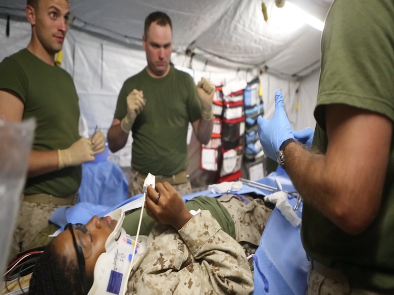 U.S. Navy medical technicians conduct a simulated surgery on a casualty during a  Marine Corps Combat Readiness Evaluation completed by 1st Medical Battalion, 1st Marine Logistics Group at Camp Pendleton, Calif., Oct 17-21, 2016. The MCCRE was designed to push the Sailors and Marines to the limit with scenarios they would be likely to see in a combat environment such as improvised explosive devices, downed aircraft and mass casualty drills. Marines and Sailors were required to work side-by-side to ensure mission success. (U.S. Marine Corps photo by Lance Cpl. Jocelyn Ontiveros)