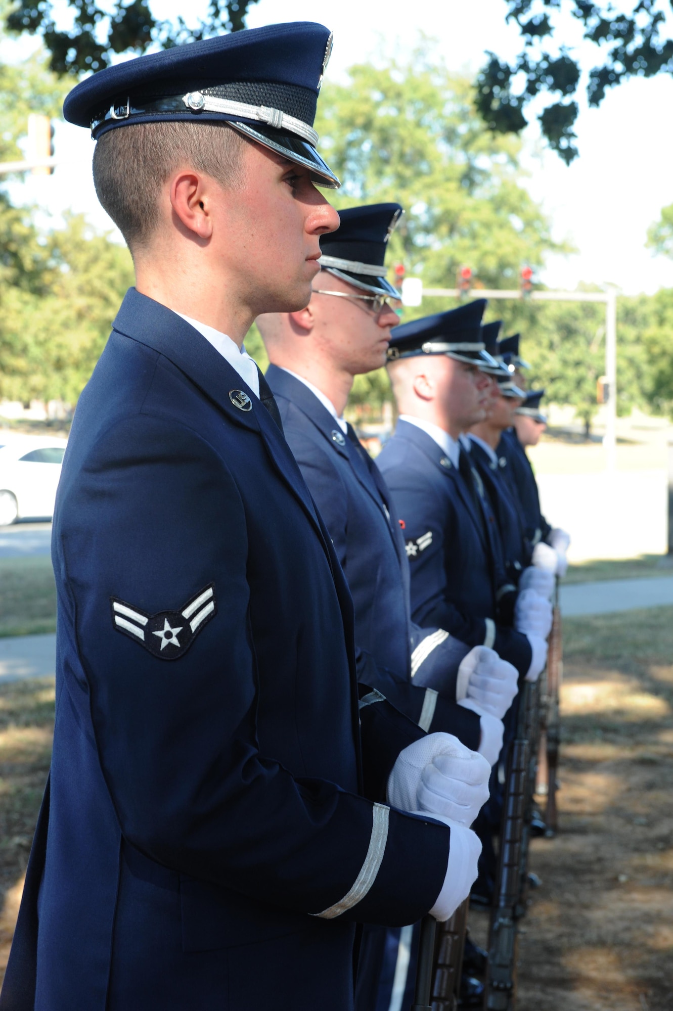 U.S. Air Force Honor Guard firing party members await orders during a full-military honors funeral demonstration Oct. 6, 2016 Little Rock Air Force Base, Ark. Team Little Rock Honor Guard members are selected from the base populace for a six month tour on the team. (U.S. Air Force photo by Airman Grace Nichols)