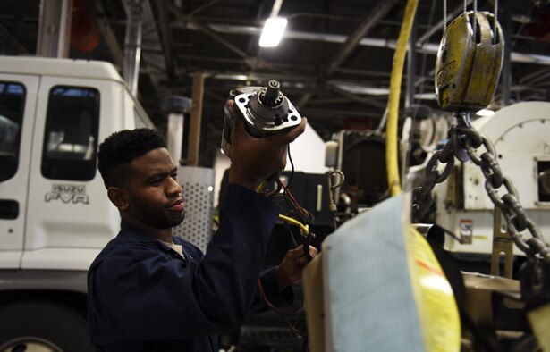 Senior Airman Brandon Johnson, 92nd Logistics Readiness Squadron materiel handling and equipment journeyman, takes a carburetor off an engine Oct. 13, 2016, at Fairchild Air Force Base. His leadership selected him as one of Fairchild’s Finest, a weekly recognition program that highlights top-performing Airmen.
(U.S. Air Force photo/Airman 1st Class Sean Campbell)

