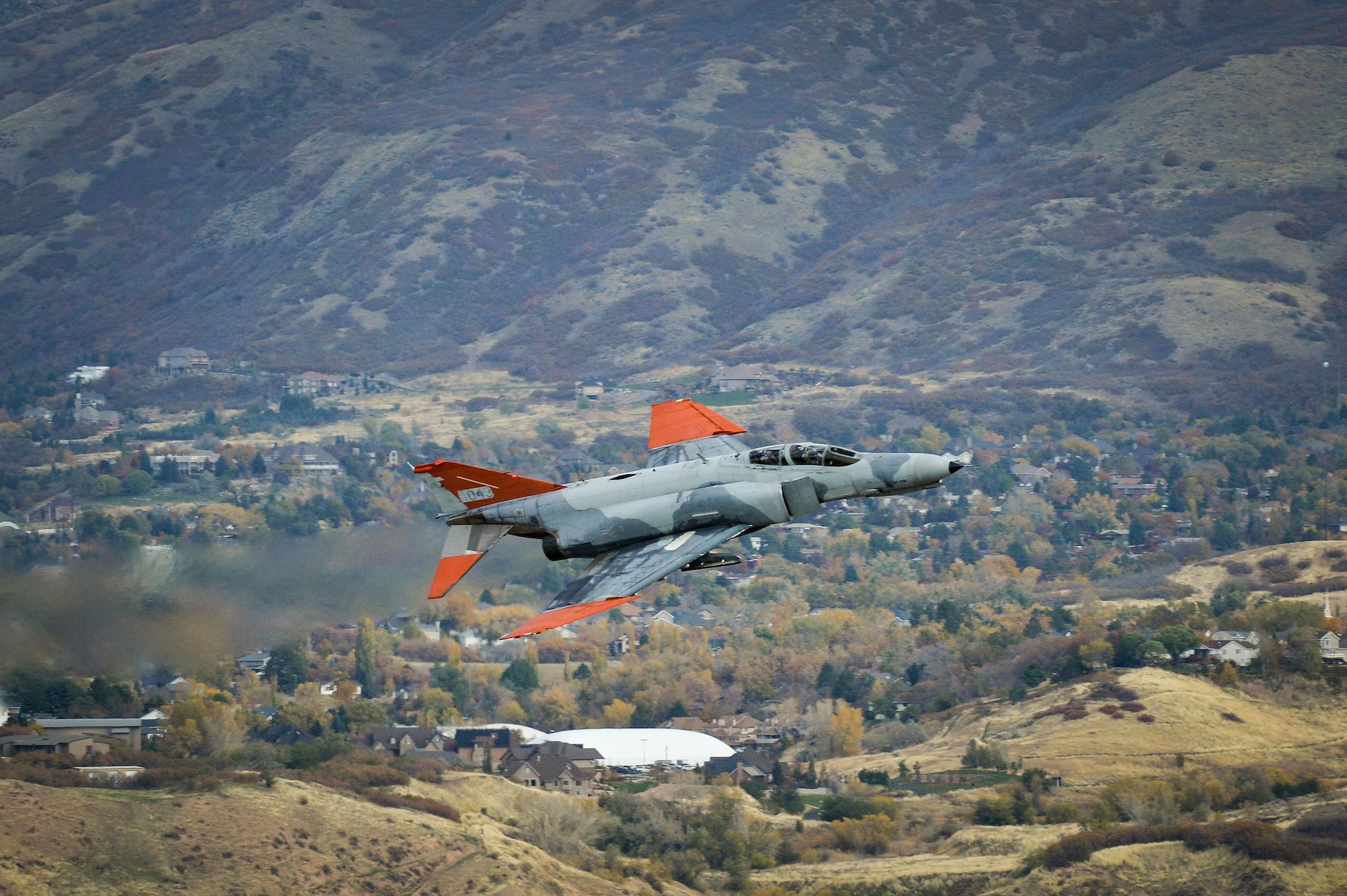 A QF-4 Aerial Target aircraft in manned configuration, piloted by Lt. Col. Ron King, 82nd Aerial Targets Squadron, Detachment 1 commander, Holloman Air Force Base, New Mexico, performs a flyby at Hill Air Force Base, Oct. 25. (U.S. Air Force photo by R. Nial Bradshaw)