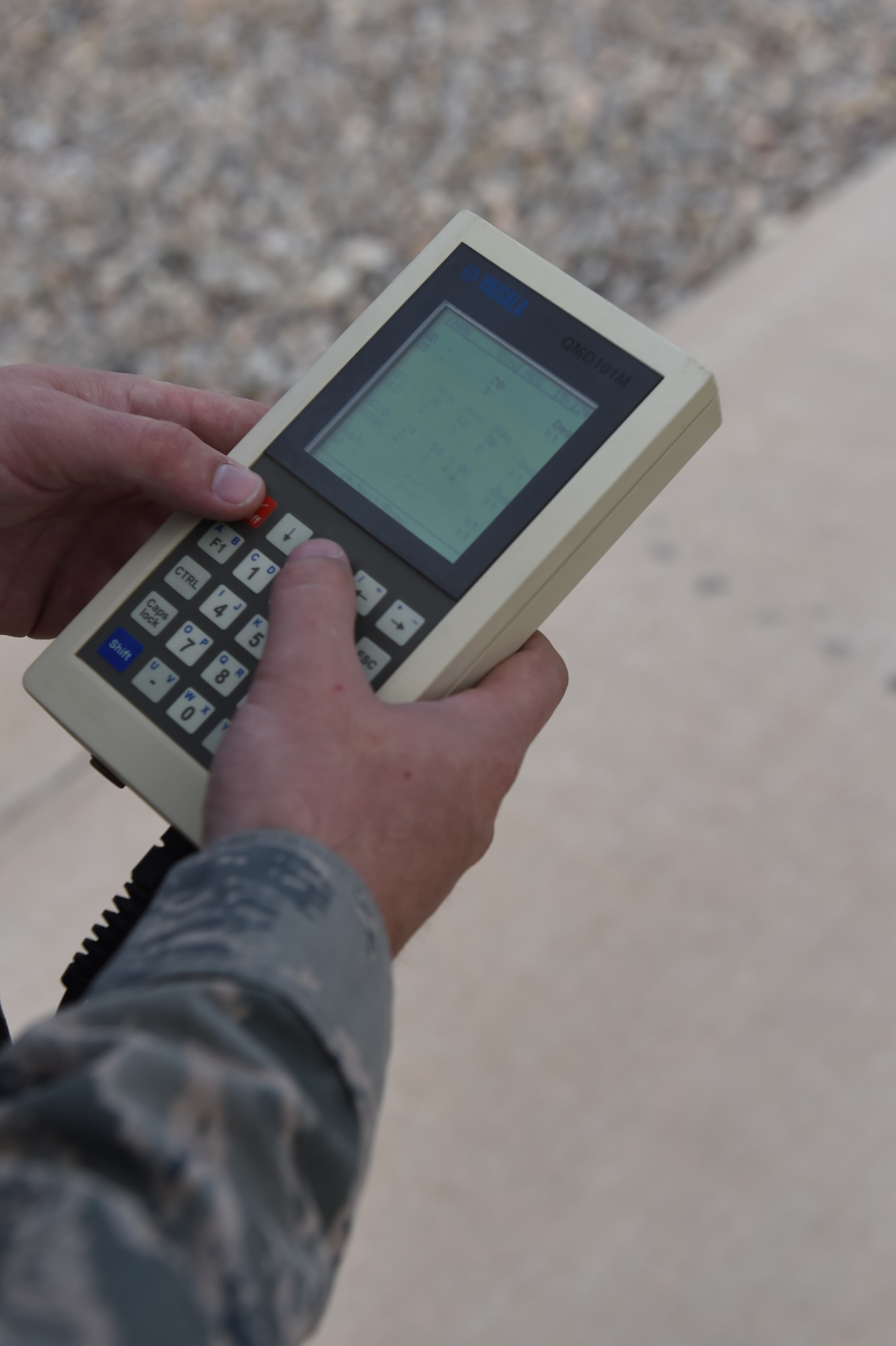 Staff Sgt. Jonathan, a 49th Operations Support Squadron weather forecast technician, conducts a test with the Tactical Meteorological Observation System on Oct. 6, 2016 at Holloman Air Force Base N.M. The system can detect humidity, lightning, wind, visibility, temperature and present weather conditions. (U.S. Air Force photo by Staff Sgt. Warren Spearman)