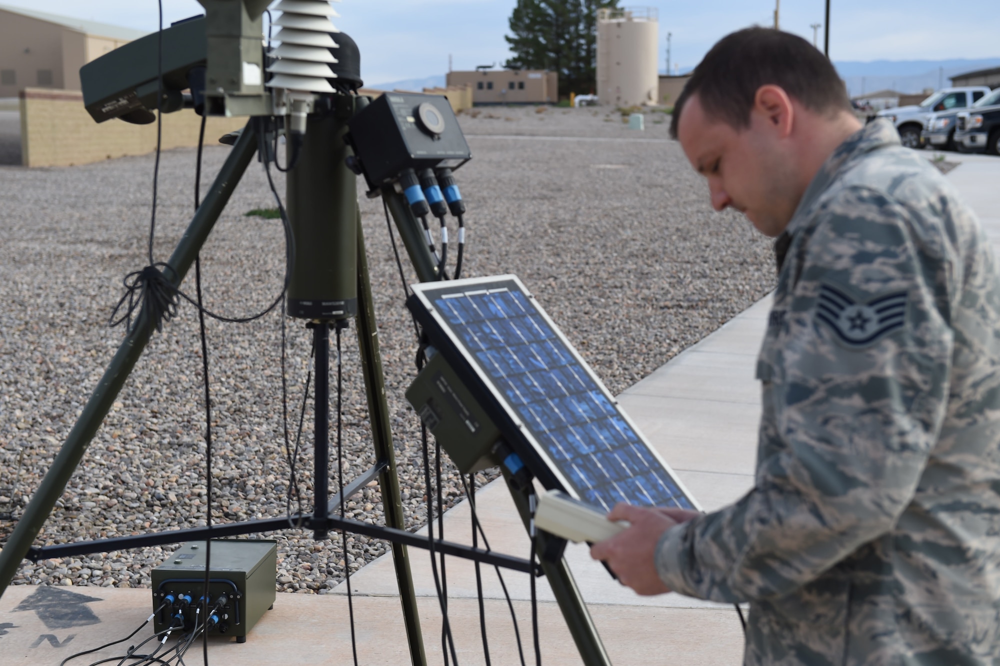 Staff Sgt. Jonathan, a 49th Operations Support Squadron weather forecast technician, conducts a test with the Tactical Meteorological Observation System on Oct. 6, 2016 at Holloman Air Force Base N.M. The system can detect humidity, lightning, wind, visibility, temperature and present weather conditions. (U.S. Air Force photo by Staff Sgt. Warren Spearman)