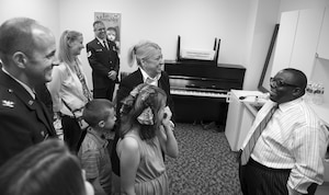 Cyrus Chestnut, jazz pianist, meets with Col. E. John Teichert, Joint Base Andrews and 11th Wing commander, and concert attendees, during a 2016 Jazz Heritage Series performance at the Rachel M. Schlesinger Concert Hall in Alexandria, Va., Oct. 21, 2016. Each year, a Jazz Heritage Series performance features a legendary icon of jazz. Chestnut has worked with many big bands, including the Lincoln Center Jazz Orchestra and the Dizzy Gillespie All-Star Big Band. (U.S. Air Force photo by Airman Gabrielle Spalding)